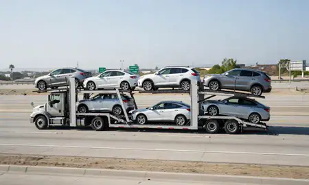 Multi-level car carrier on the highway to Santa Ana, California, United States