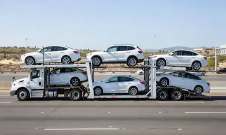 Multi-level car carrier on the highway to Santa Clarita, California, United States