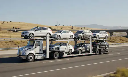 Multi-level car carrier on the highway to Santa Rosa, California, United States