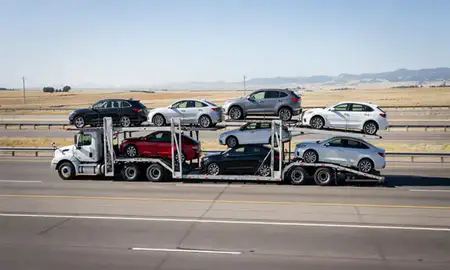 Multi-level car carrier on the highway to Arvada, Colorado, United States