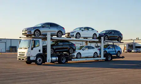 Car transporter loaded with vehicles in Aurora, Colorado, United States