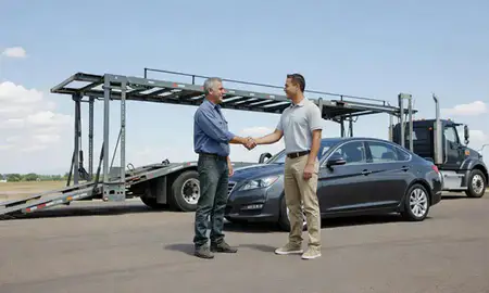 Vehicle owner beside their delivered car in Broomfield, Colorado, United States