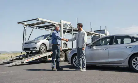 Vehicle owner beside their delivered car in Castle Rock, Colorado, United States