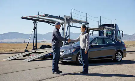 Vehicle owner beside their delivered car in Colorado Springs, Colorado, United States