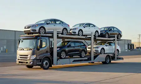 Car transporter loaded with vehicles in Denver, Colorado, United States