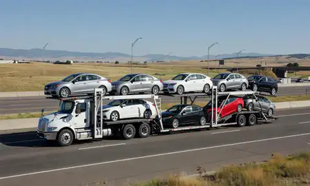 Multi-level car carrier on the highway to Fort Collins, Colorado, United States