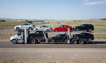 Multi-level car carrier on the highway to Lafayette, Colorado, United States