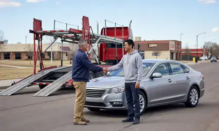 Vehicle owner beside their delivered car in Lafayette, Colorado, United States