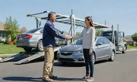 Vehicle owner beside their delivered car in Littleton, Colorado, United States