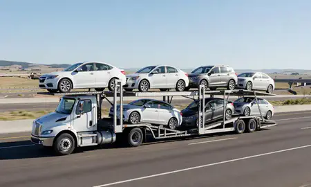 Multi-level car carrier on the highway to Loveland, Colorado, United States