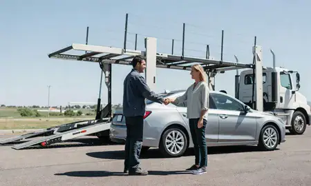 Vehicle owner beside their delivered car in Loveland, Colorado, United States