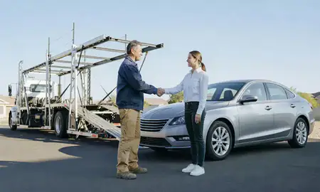 Vehicle owner beside their delivered car in Parker, Colorado, United States