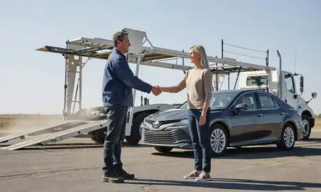 Vehicle owner beside their delivered car in Security-Widefield, Colorado, United States