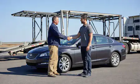 Vehicle owner beside their delivered car in Bridgeport, Connecticut, United States