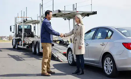 Vehicle owner beside their delivered car in Conning Towers Nautilus Park, Connecticut, United States
