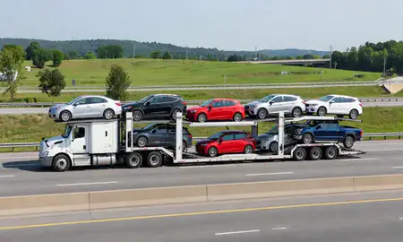 Multi-level car carrier on the highway to Danbury, Connecticut, United States