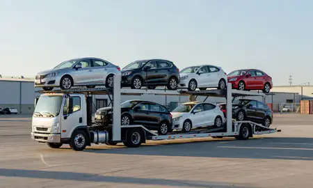 Car transporter loaded with vehicles in Hartford, Connecticut, United States