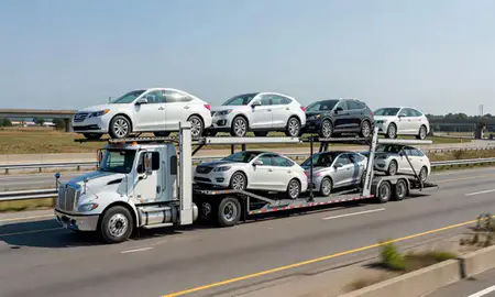 Multi-level car carrier on the highway to Kensington, Connecticut, United States