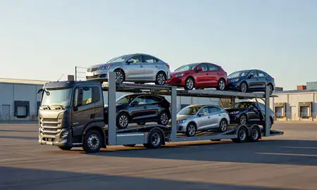 Car transporter loaded with vehicles in Meriden, Connecticut, United States