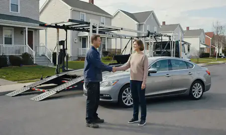 Vehicle owner beside their delivered car in Middletown, Connecticut, United States