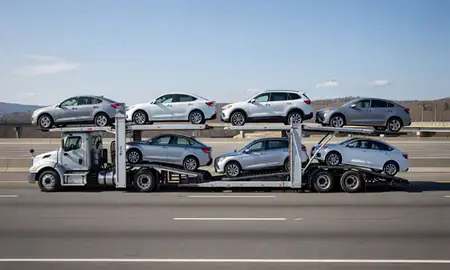 Multi-level car carrier on the highway to Milford city, Connecticut, United States