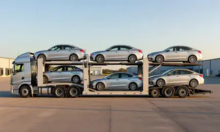 Car transporter parked in an industrial area of New Britain, Connecticut, United States