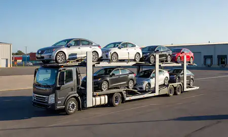 Car transporter loaded with vehicles in New Britain, Connecticut, United States