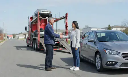Vehicle owner beside their delivered car in Norwalk, Connecticut, United States