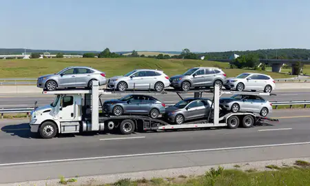 Multi-level car carrier on the highway to Shelton, Connecticut, United States