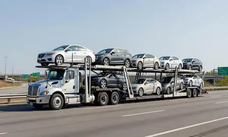 Multi-level car carrier on the highway to Stamford, Connecticut, United States