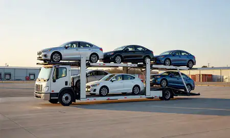 Car transporter loaded with vehicles in Torrington, Connecticut, United States