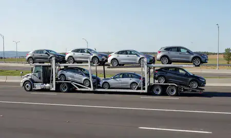 Multi-level car carrier on the highway to Trumbull Center, Connecticut, United States