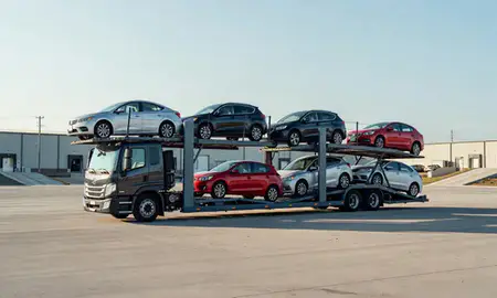 Car transporter loaded with vehicles in Trumbull Center, Connecticut, United States