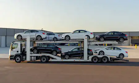 Car transporter parked in an industrial area of Wallingford Center, Connecticut, United States