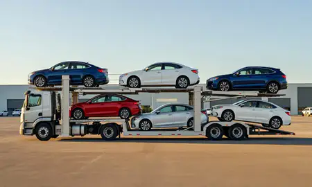 Car transporter parked in an industrial area of Waterbury, Connecticut, United States