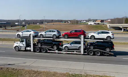 Multi-level car carrier on the highway to Willimantic, Connecticut, United States
