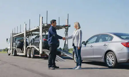 Vehicle owner beside their delivered car in Delaware, United States