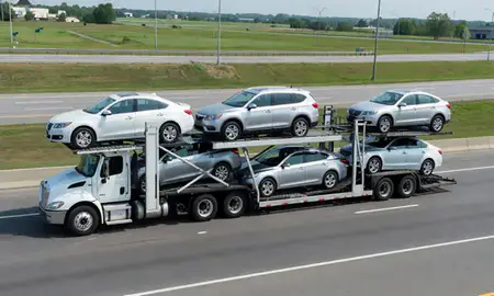Multi-level car carrier on the highway to Claymont, Delaware, United States