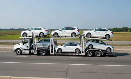 Multi-level car carrier on the highway to Clayton, Delaware, United States
