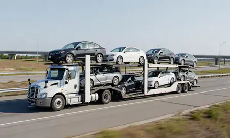 Multi-level car carrier on the highway to Dover, Delaware, United States