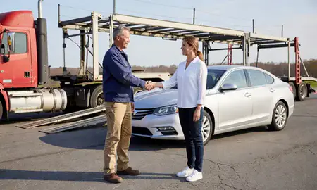Vehicle owner beside their delivered car in Edgemoor, Delaware, United States