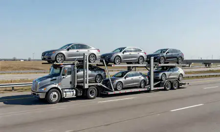 Multi-level car carrier on the highway to Laurel, Delaware, United States