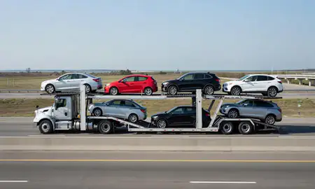 Multi-level car carrier on the highway to Lewes, Delaware, United States