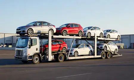 Car transporter loaded with vehicles in Milford, Delaware, United States