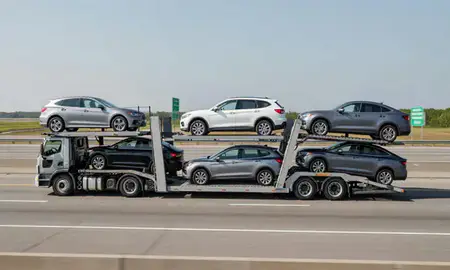 Multi-level car carrier on the highway to New Castle, Delaware, United States