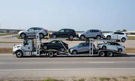 Multi-level car carrier on the highway to Pike Creek, Delaware, United States