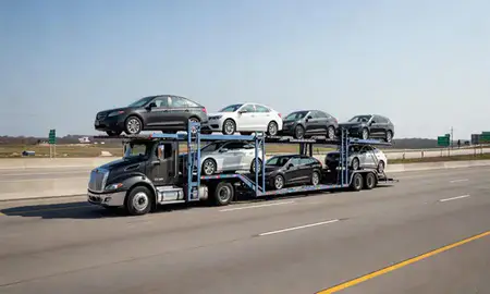 Multi-level car carrier on the highway to Wilmington Manor, Delaware, United States