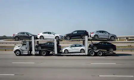 Multi-level car carrier on the highway to Wilmington, Delaware, United States