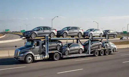 Multi-level car carrier on the highway to District of Columbia, United States