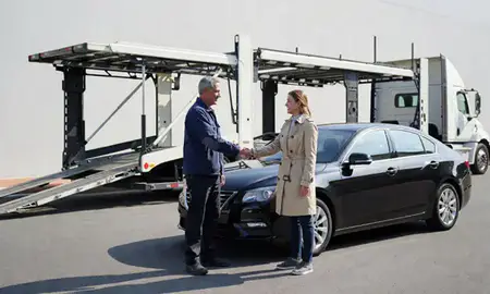 Vehicle owner beside their delivered car in District of Columbia, United States